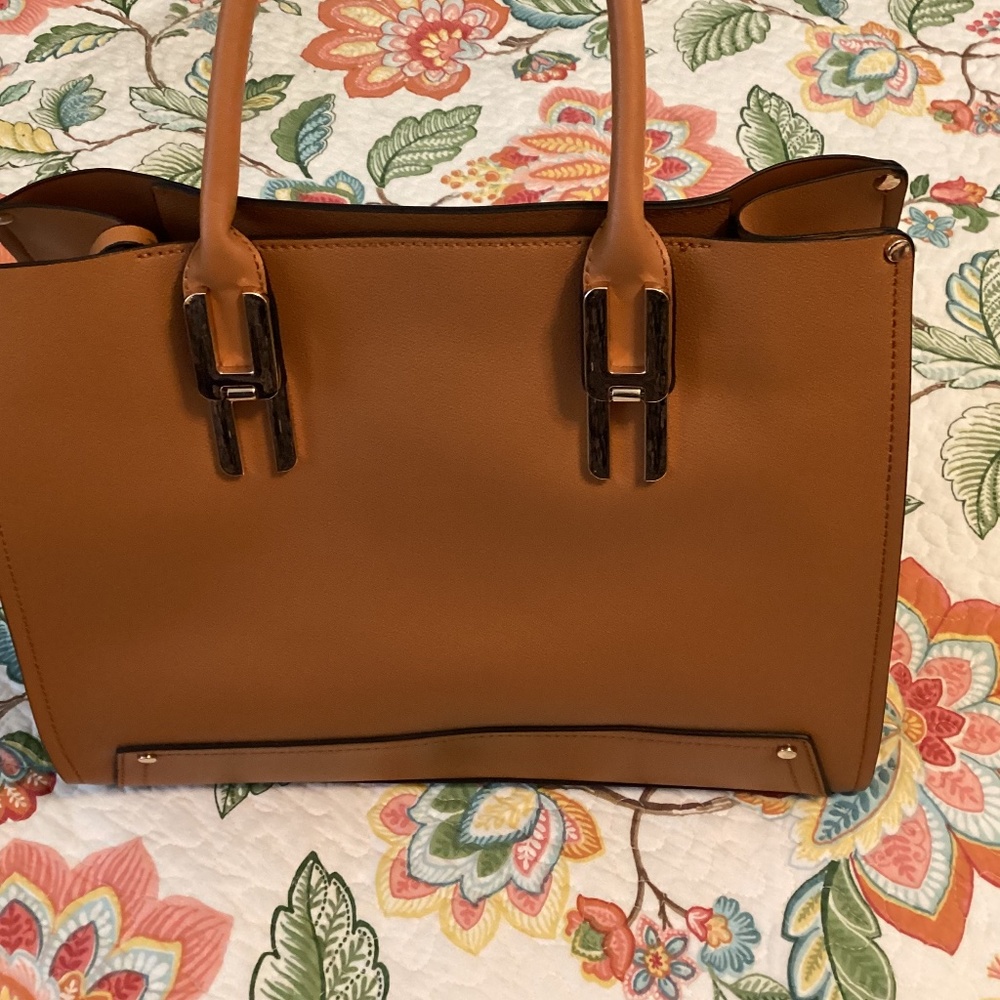Classy medium brown purse. Gently used and ready for you! 12X10X4.5inches.